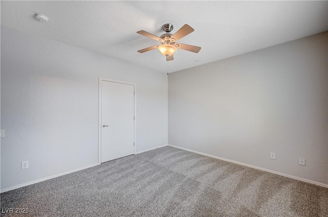 4610 Puglia Ln Unit 201, North Las Vegas, NV 89084 - spare room featuring a ceiling fan, carpet flooring, and a smoke detector