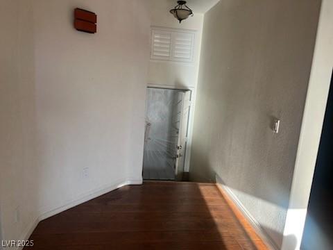 6201 E Lake Mead Blvd Unit 218, Las Vegas, NV 89156 - hall with wood finished floors and baseboards