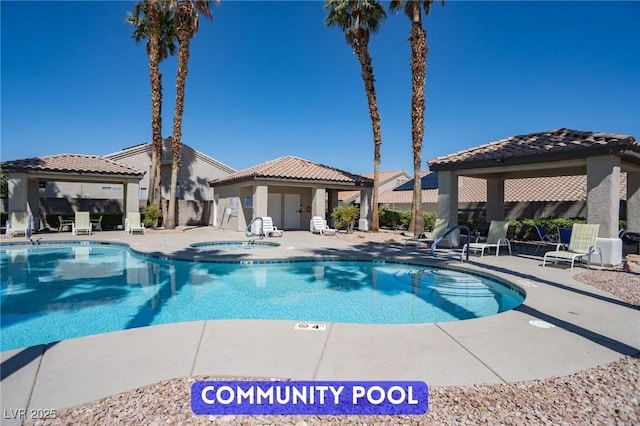 9710 Geiger Peak Ct, Las Vegas, NV 89148 - community pool featuring a gazebo, a community hot tub, and a patio area