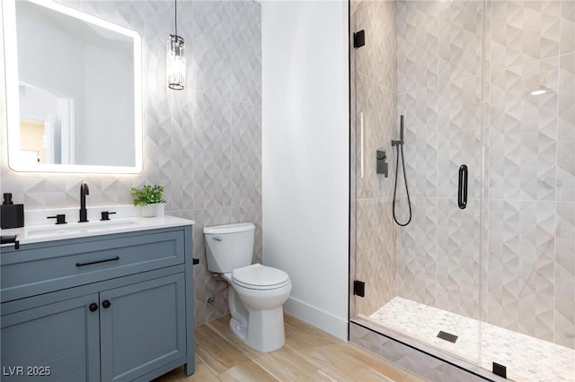 85 Alerion St, Las Vegas, NV 89138 - full bathroom with vanity, a stall shower, and wood finished floors