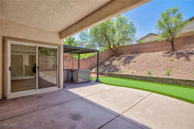 85 Alerion St, Las Vegas, NV 89138 - fenced backyard with a patio