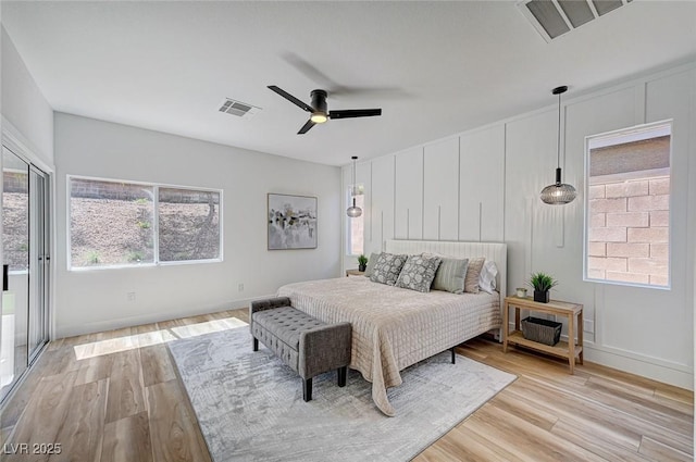 85 Alerion St, Las Vegas, NV 89138 - bedroom with light wood finished floors and ceiling fan