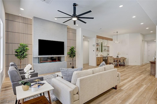 85 Alerion St, Las Vegas, NV 89138 - living area with light wood-style floors, ceiling fan, and recessed lighting