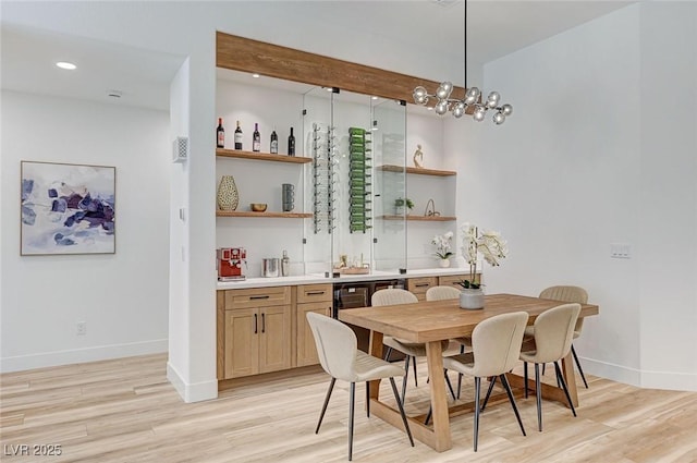 85 Alerion St, Las Vegas, NV 89138 - dining room featuring light wood-type flooring and bar