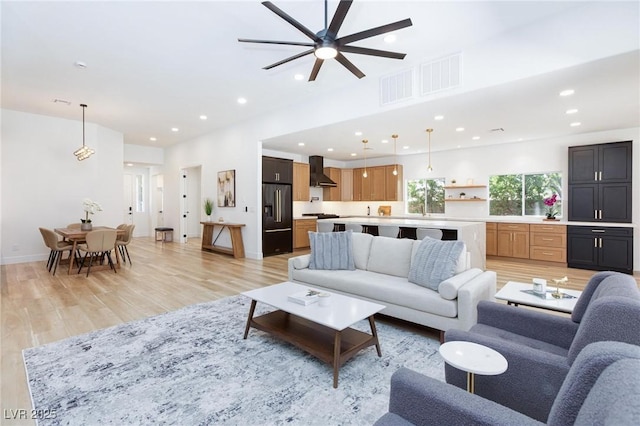 85 Alerion St, Las Vegas, NV 89138 - living room featuring light wood finished floors, ceiling fan, and recessed lighting