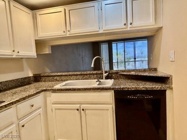 750 S Royal Crest Cir Unit 325, Las Vegas, NV 89169 - kitchen featuring dishwasher, white cabinetry, and dark stone counters