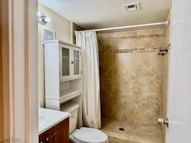 750 S Royal Crest Cir Unit 325, Las Vegas, NV 89169 - bathroom featuring vanity and a tile shower