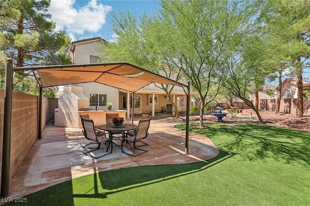 5434 Lost Ln, Las Vegas, NV 89118 - fenced backyard with a patio
