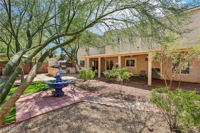 5434 Lost Ln, Las Vegas, NV 89118 - back of house featuring a patio, stucco siding, and ceiling fan