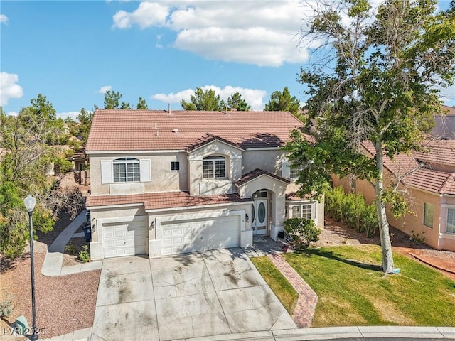 5434 Lost Ln, Las Vegas, NV 89118 - mediterranean / spanish-style home with an attached garage, a tile roof, concrete driveway, stucco siding, and a front yard