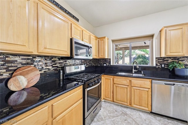 5434 Lost Ln, Las Vegas, NV 89118 - kitchen with stainless steel appliances, light brown cabinets, tasteful backsplash, and light tile patterned floors