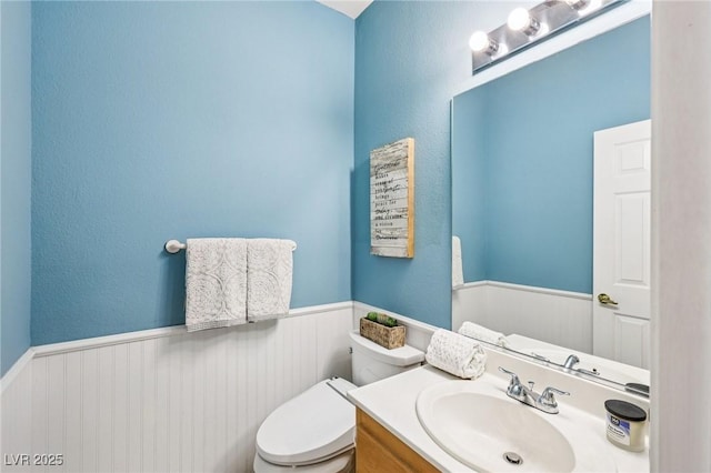 5434 Lost Ln, Las Vegas, NV 89118 - bathroom featuring wainscoting and vanity