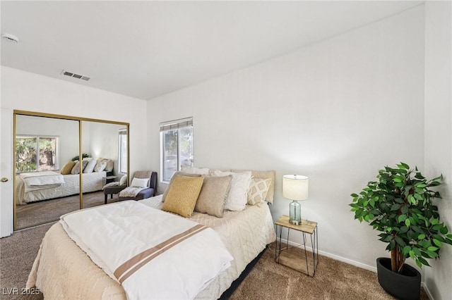 5434 Lost Ln, Las Vegas, NV 89118 - carpeted bedroom with a closet and baseboards