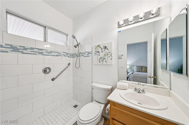 5434 Lost Ln, Las Vegas, NV 89118 - full bathroom featuring a tile shower, ensuite bath, and vanity