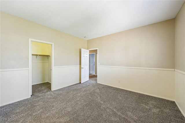 5434 Lost Ln, Las Vegas, NV 89118 - unfurnished bedroom featuring carpet flooring and a spacious closet