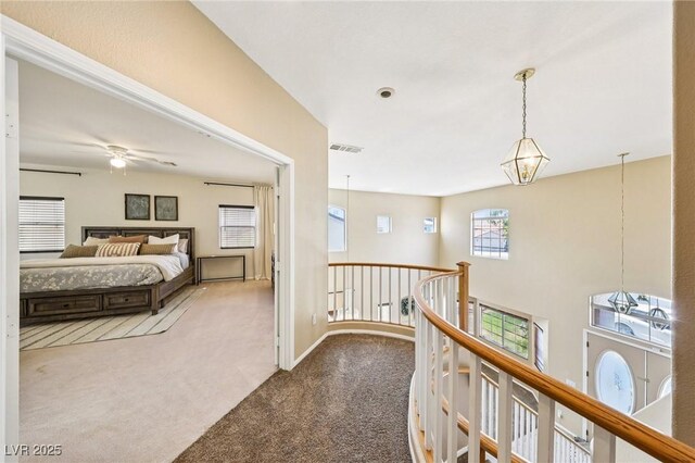 5434 Lost Ln, Las Vegas, NV 89118 - hall with an upstairs landing and carpet flooring