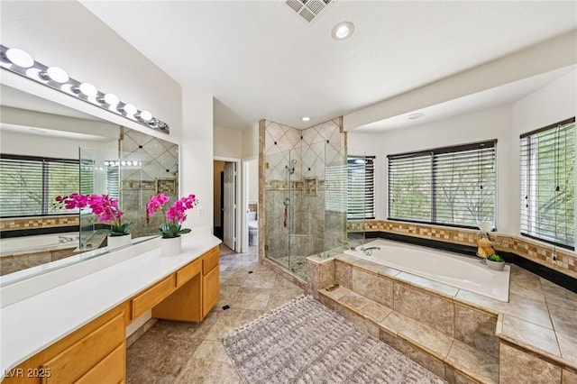 5434 Lost Ln, Las Vegas, NV 89118 - bathroom featuring a bath, vanity, a shower stall, and recessed lighting