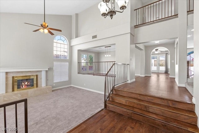 2842 Via Florentine St, Henderson, NV 89074 - entryway with a high ceiling, plenty of natural light, a ceiling fan, wood finished floors, and stairway