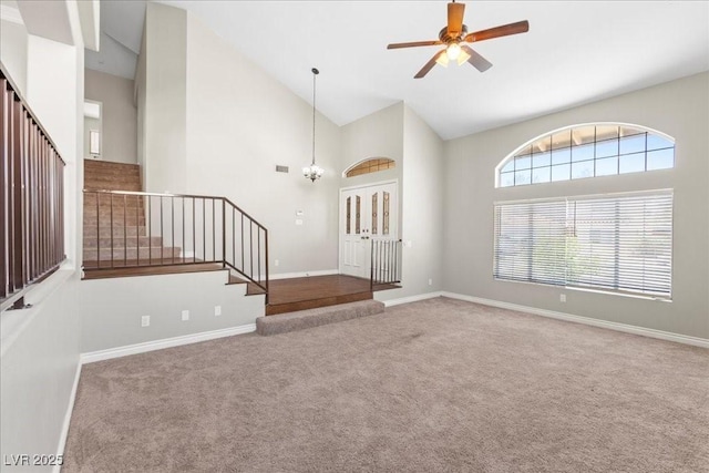 2842 Via Florentine St, Henderson, NV 89074 - foyer featuring stairs, carpet floors, high vaulted ceiling, ceiling fan, and a chandelier