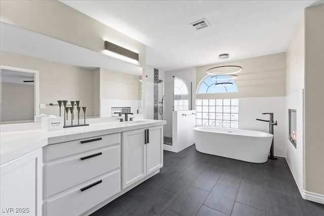 2842 Via Florentine St, Henderson, NV 89074 - full bath featuring double vanity, a soaking tub, and a walk in shower