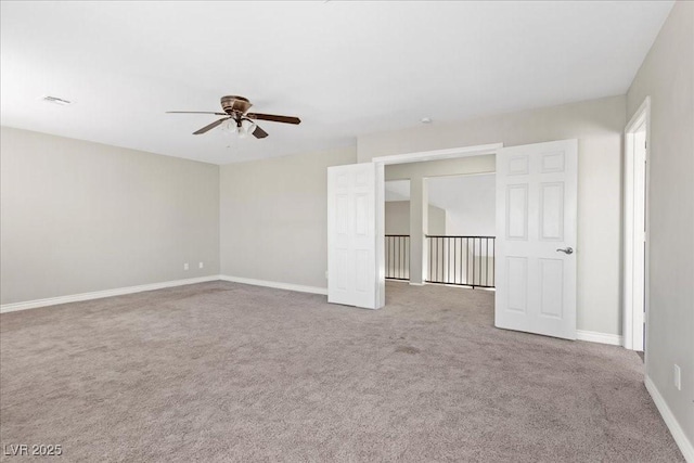 2842 Via Florentine St, Henderson, NV 89074 - carpeted spare room featuring ceiling fan and baseboards