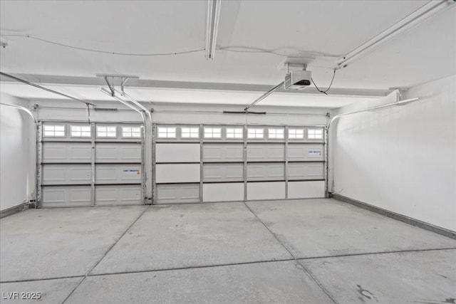 2842 Via Florentine St, Henderson, NV 89074 - garage with a garage door opener and baseboards