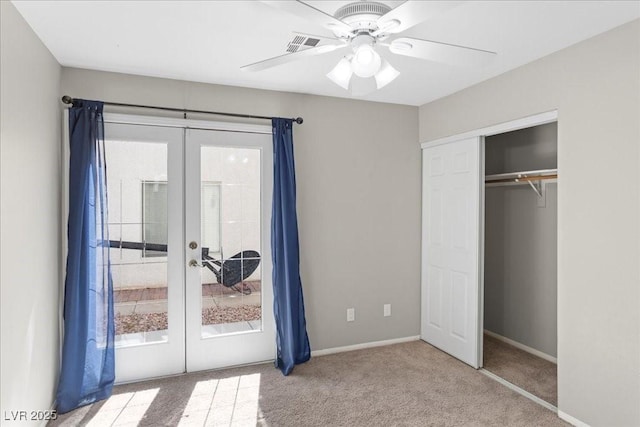 2842 Via Florentine St, Henderson, NV 89074 - unfurnished bedroom with french doors, carpet, a ceiling fan, and a closet