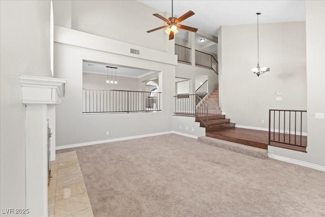 2842 Via Florentine St, Henderson, NV 89074 - unfurnished living room featuring a chandelier, a ceiling fan, carpet, high vaulted ceiling, and stairs