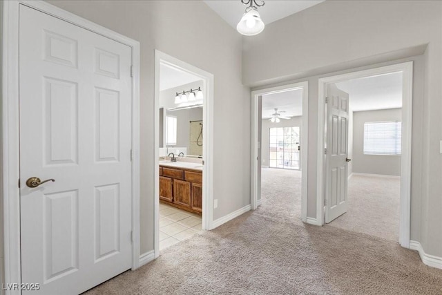 2842 Via Florentine St, Henderson, NV 89074 - hallway featuring light colored carpet and baseboards