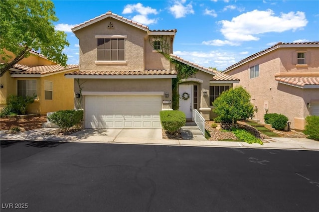 10372 Natural Springs Ave, Las Vegas, NV 89129 - mediterranean / spanish-style home with stucco siding, a tiled roof, driveway, and an attached garage