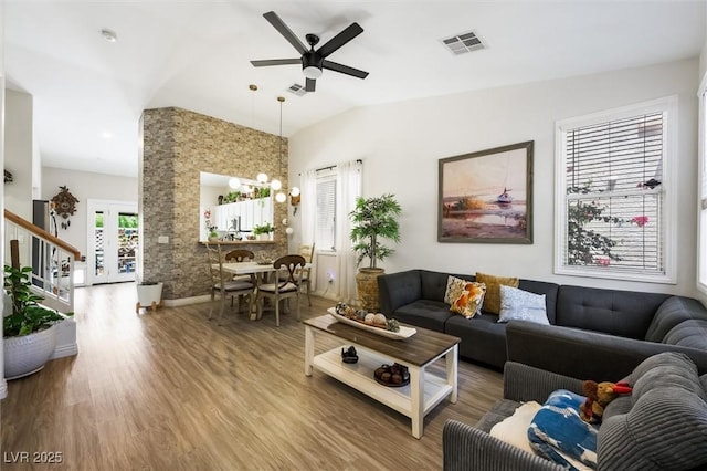 10372 Natural Springs Ave, Las Vegas, NV 89129 - living area featuring ceiling fan, wood finished floors, and stairway