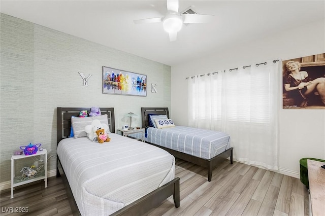10372 Natural Springs Ave, Las Vegas, NV 89129 - bedroom featuring light wood-style floors and a ceiling fan