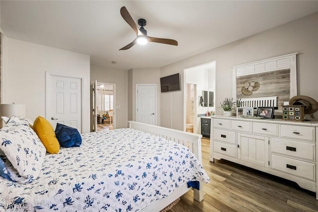 10372 Natural Springs Ave, Las Vegas, NV 89129 - bedroom with wood finished floors, ensuite bath, and ceiling fan