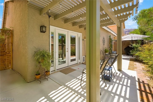 10372 Natural Springs Ave, Las Vegas, NV 89129 - view of patio / terrace with french doors and a pergola