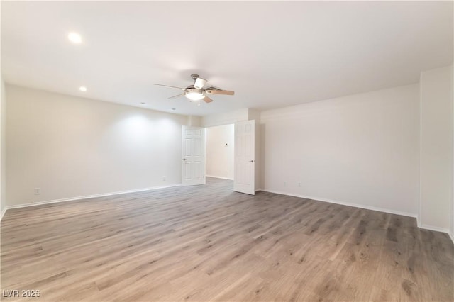 9578 Teton Vista Ave, Las Vegas, NV 89117 - spare room with a ceiling fan, light wood-type flooring, and recessed lighting