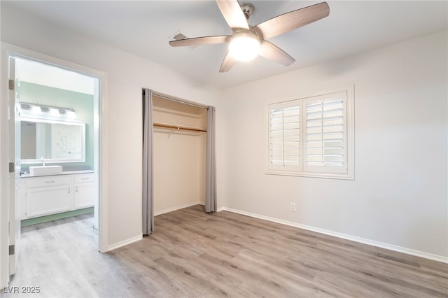 9578 Teton Vista Ave, Las Vegas, NV 89117 - unfurnished bedroom with light wood-type flooring, a closet, a ceiling fan, and ensuite bath