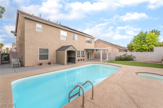 9578 Teton Vista Ave, Las Vegas, NV 89117 - view of pool featuring a patio area, a fenced backyard, a gate, and a ceiling fan