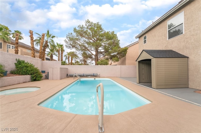 9578 Teton Vista Ave, Las Vegas, NV 89117 - view of swimming pool with a fenced backyard, a patio, and an in-ground hot tub