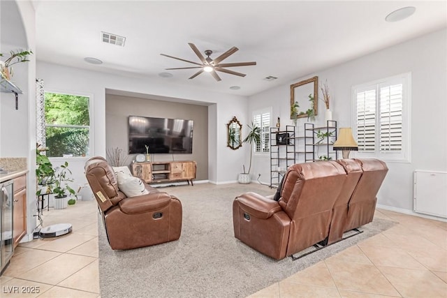 1521 Antler Creek St, North Las Vegas, NV 89084 - living room with a ceiling fan, plenty of natural light, and light tile patterned floors