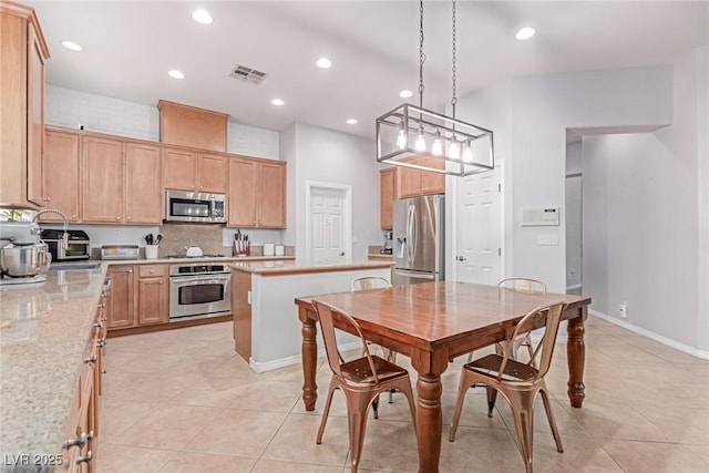 1521 Antler Creek St, North Las Vegas, NV 89084 - dining area featuring light tile patterned flooring and recessed lighting