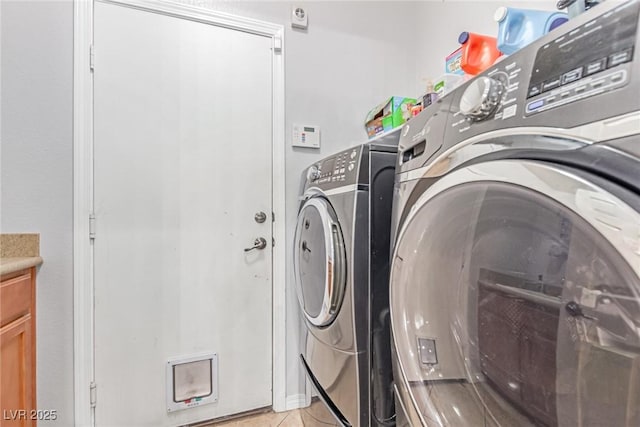 1521 Antler Creek St, North Las Vegas, NV 89084 - laundry area featuring independent washer and dryer and light tile patterned flooring