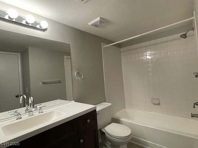 2300 E Silverado Ranch Blvd Unit 1180, Las Vegas, NV 89183 - full bathroom with a textured ceiling, vanity, tub / shower combination, and a textured wall