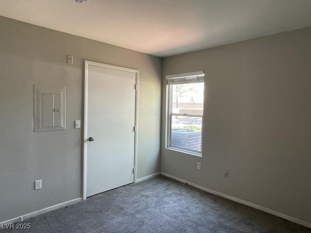 2300 E Silverado Ranch Blvd Unit 1180, Las Vegas, NV 89183 - unfurnished bedroom with electric panel and carpet floors