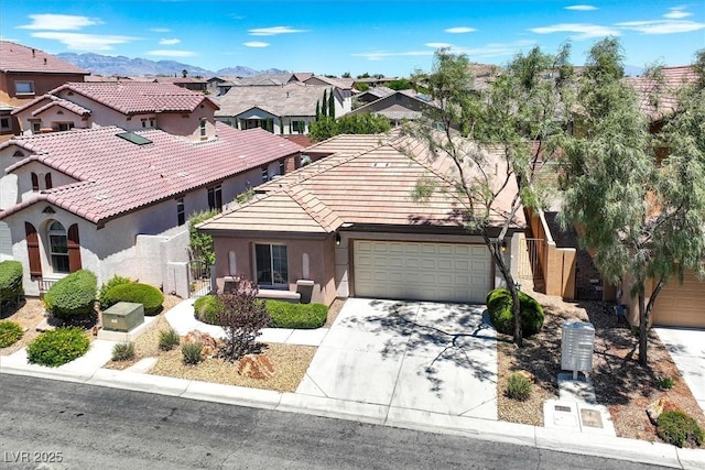 7558 Schuders Ave, Las Vegas, NV 89178 - view of front of home featuring stucco siding, driveway, a residential view, a tile roof, and an attached garage