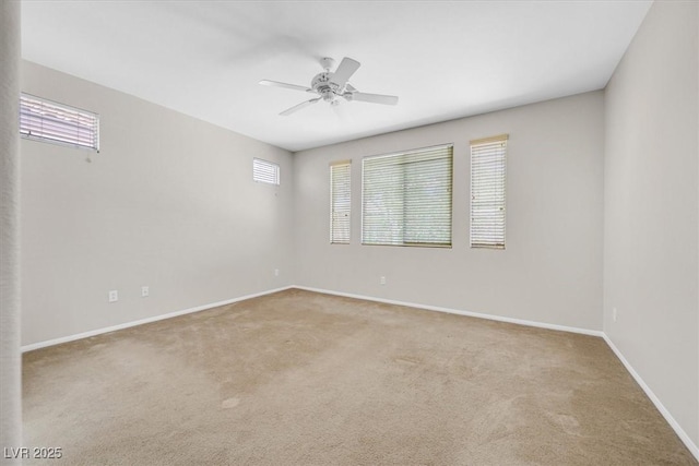 7558 Schuders Ave, Las Vegas, NV 89178 - empty room featuring carpet floors, plenty of natural light, and a ceiling fan