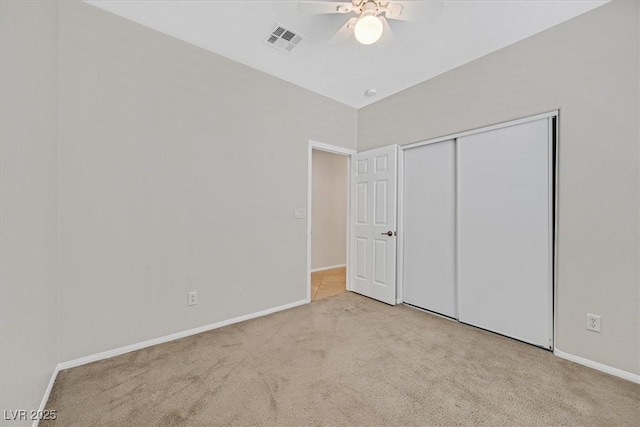 7558 Schuders Ave, Las Vegas, NV 89178 - unfurnished bedroom featuring carpet, a closet, and ceiling fan