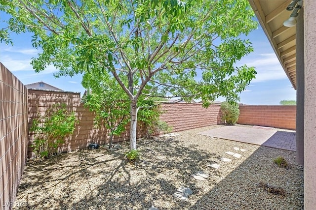 7558 Schuders Ave, Las Vegas, NV 89178 - fenced backyard with a patio