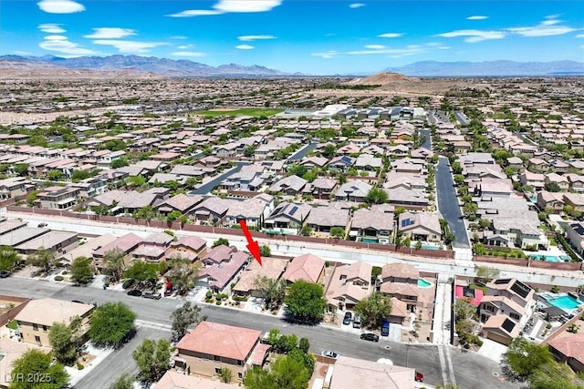 7558 Schuders Ave, Las Vegas, NV 89178 - aerial view of residential area featuring a mountain backdrop