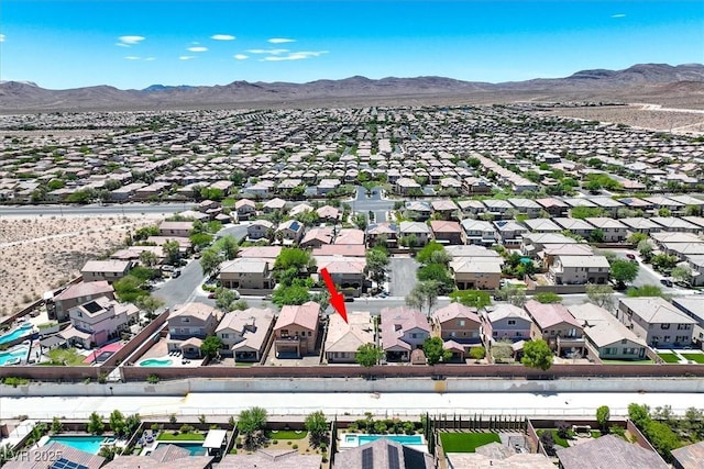 7558 Schuders Ave, Las Vegas, NV 89178 - aerial view of residential area featuring a mountainous background
