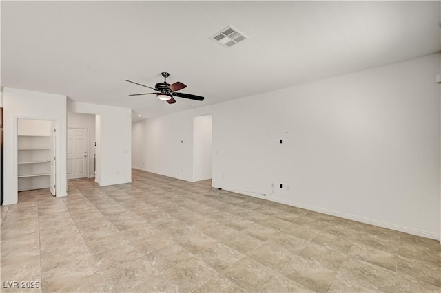 138 Red Sandstone Ave, North Las Vegas, NV 89031 - unfurnished living room featuring a ceiling fan and baseboards